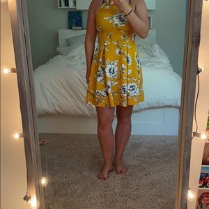 Yellow high necked flowery dress
